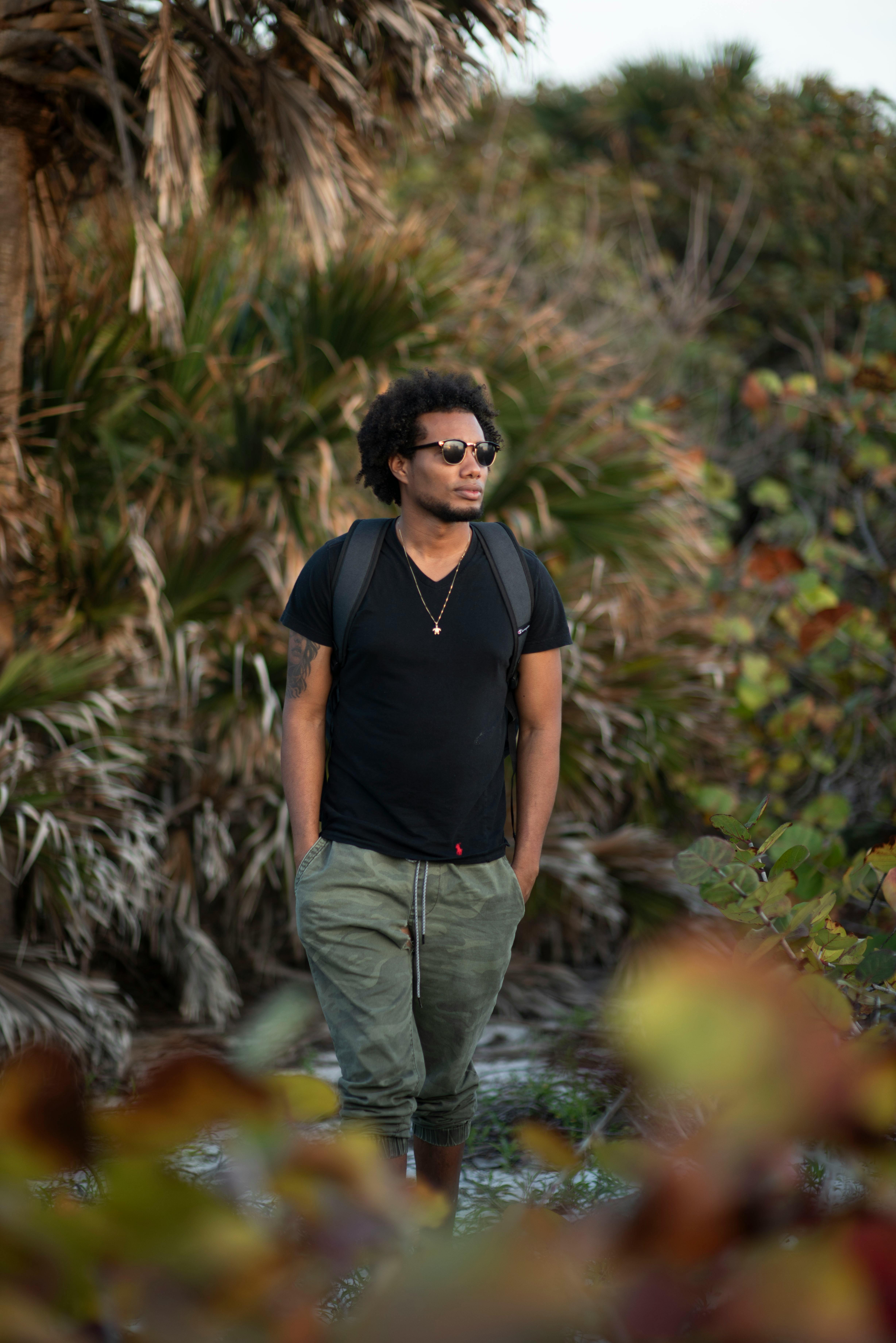 male model walking in nature