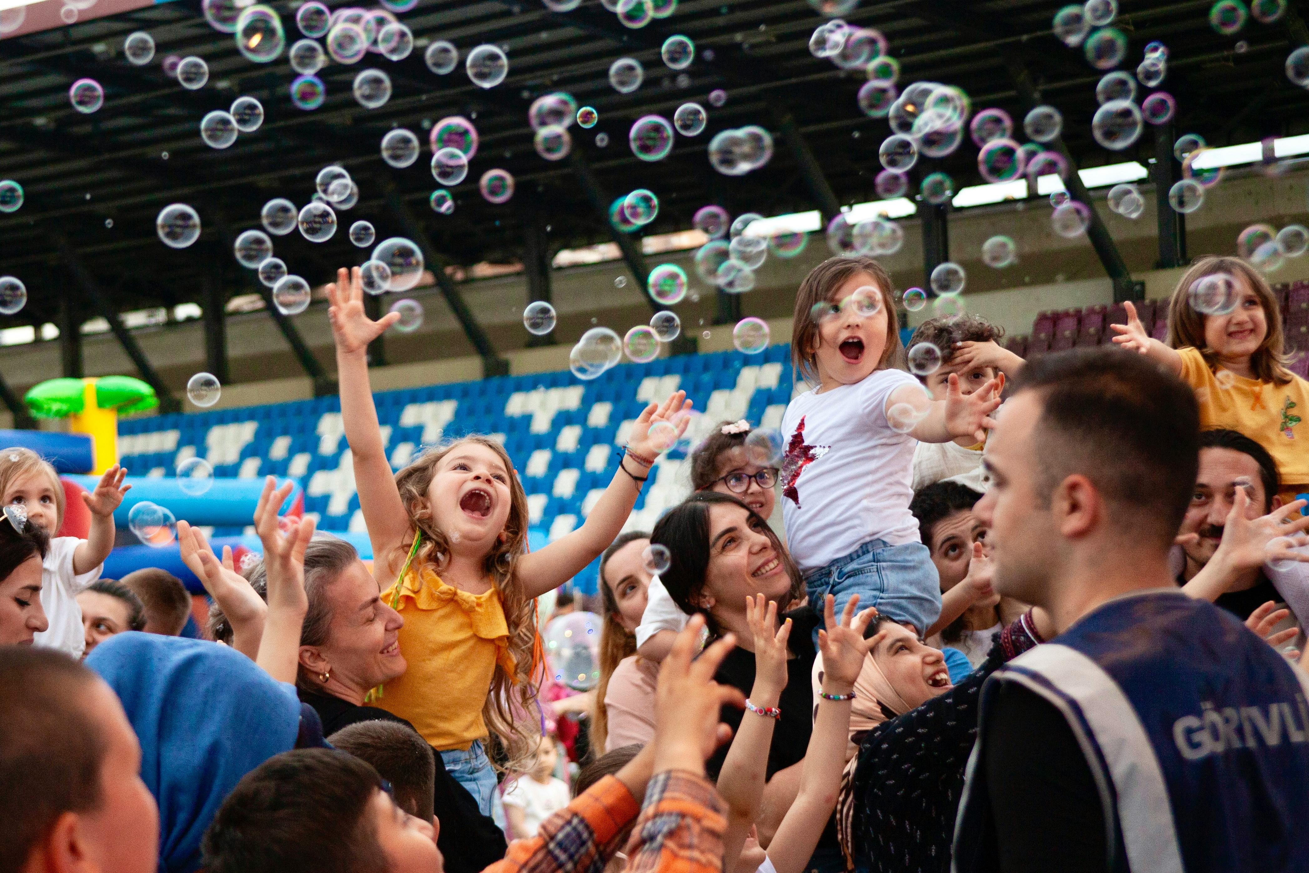 Children playing at Christ Embassy Loveworld Arena family event in Ho