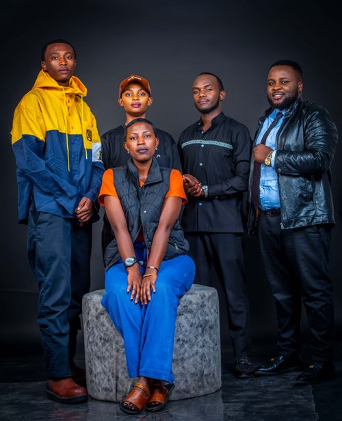 Free Dynamic group portrait highlighting diverse fashion styles and confident expressions. Stock Photo