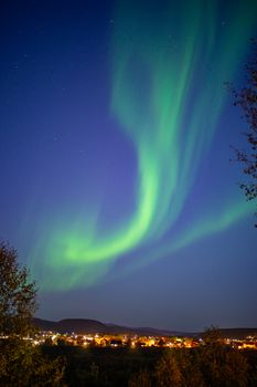 Stunning aurora borealis dancing over Karasjok, Norway's night sky, captivating and vibrant.