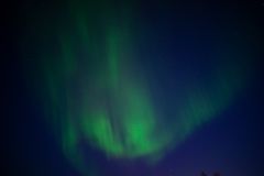 Stunning Aurora Borealis illuminating the night sky in Karasjok, Norway.