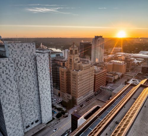 Free Beautiful aerial view of Rochester, MN cityscape with sunrise illuminating the skyline. Stock Photo