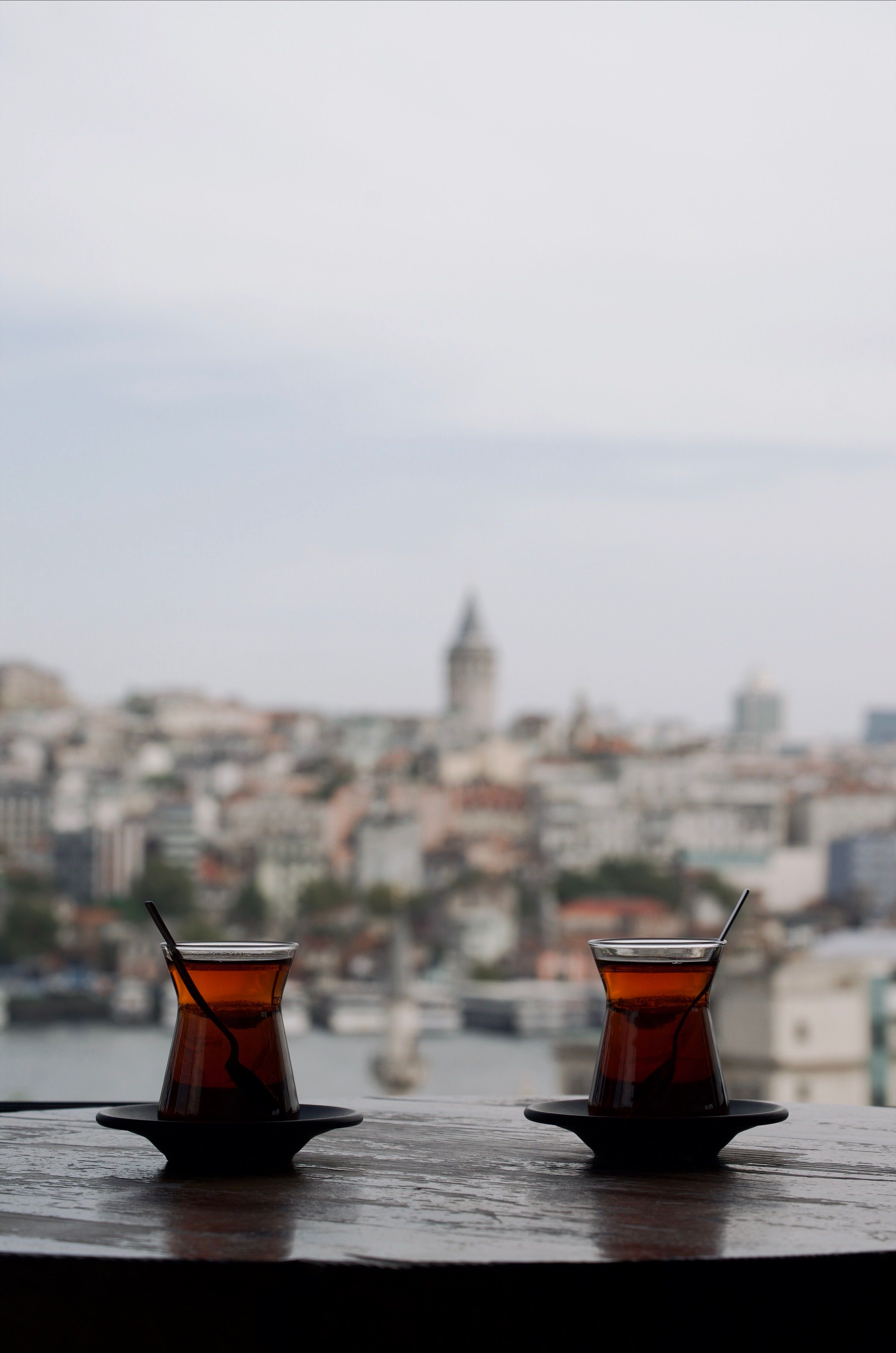 Glasses of Tea Standing on the Table with View of Istanbul Skyline ...