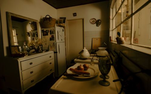 Free Warm, vintage kitchen with a cozy atmosphere, featuring classic decor and natural lighting. Stock Photo