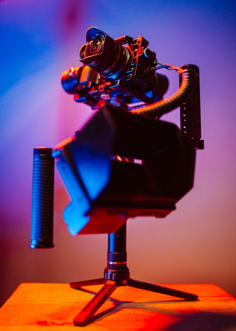 Close-up of a professional videography setup with a camera mounted on a gimbal, showcasing advanced equipment.