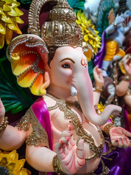 Free Colorful Ganesh idol adorned with intricate decorations during a Kolkata festival celebration. Stock Photo