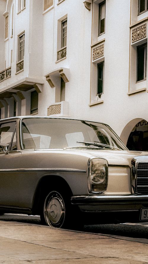 Free Vintage Mercedes Benz parked on a quaint street in Rabat, Morocco. Stock Photo