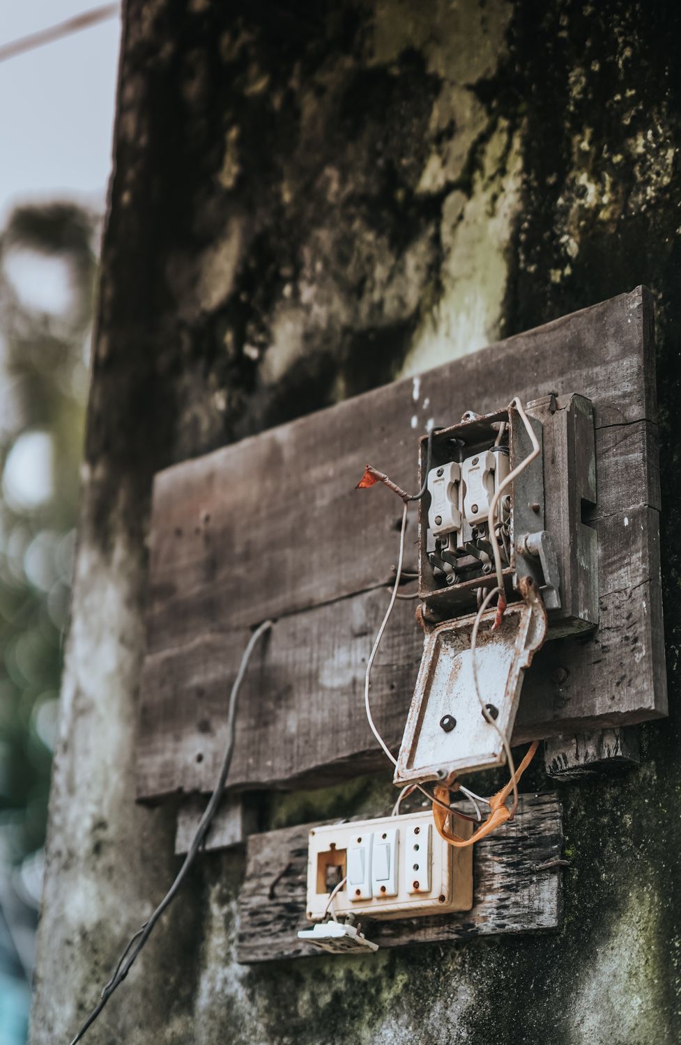 An old electrical box with wires and a switch ยท Free Stock Photo