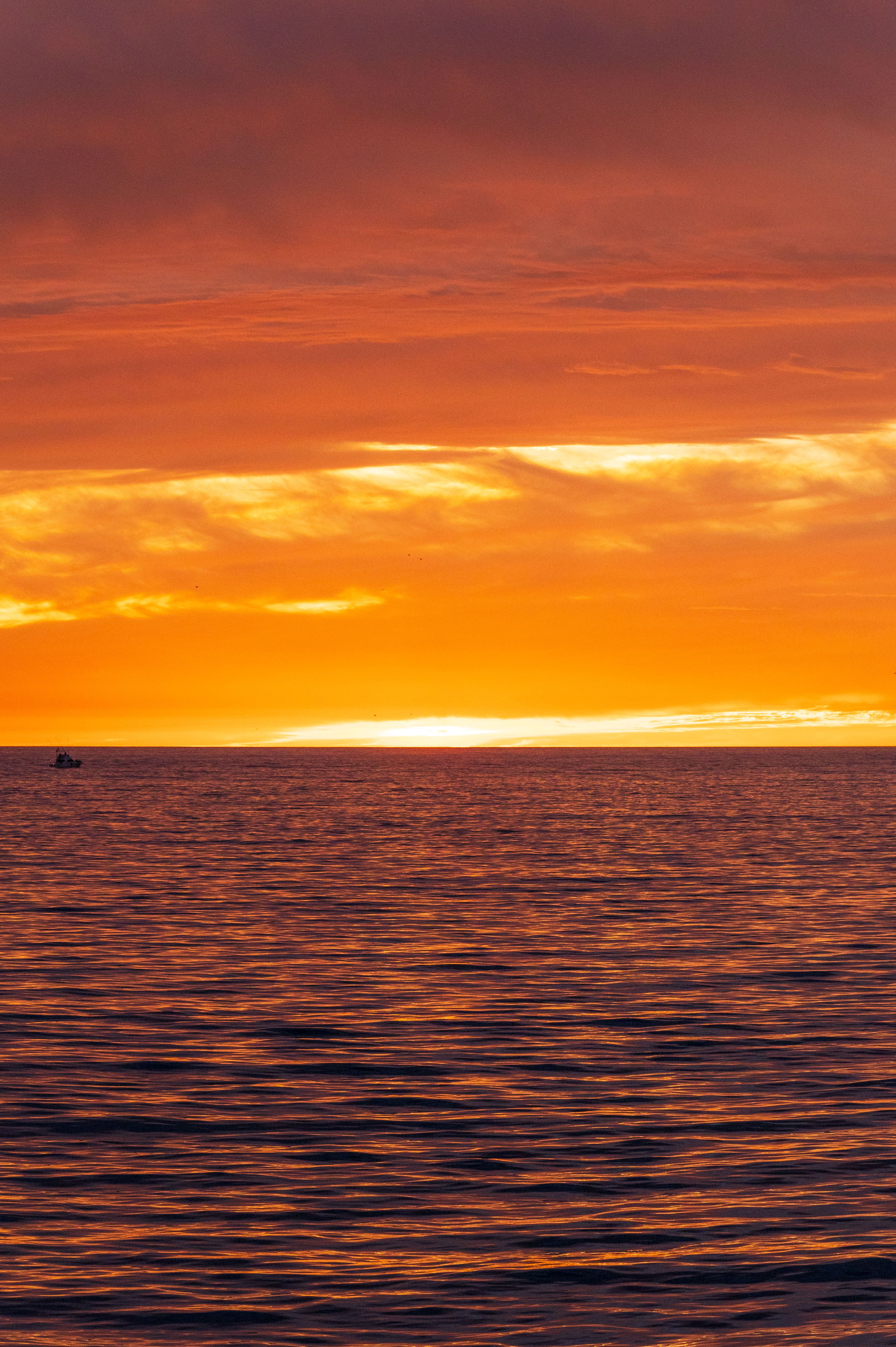Yellow Sky over Sea at Sunset · Free Stock Photo