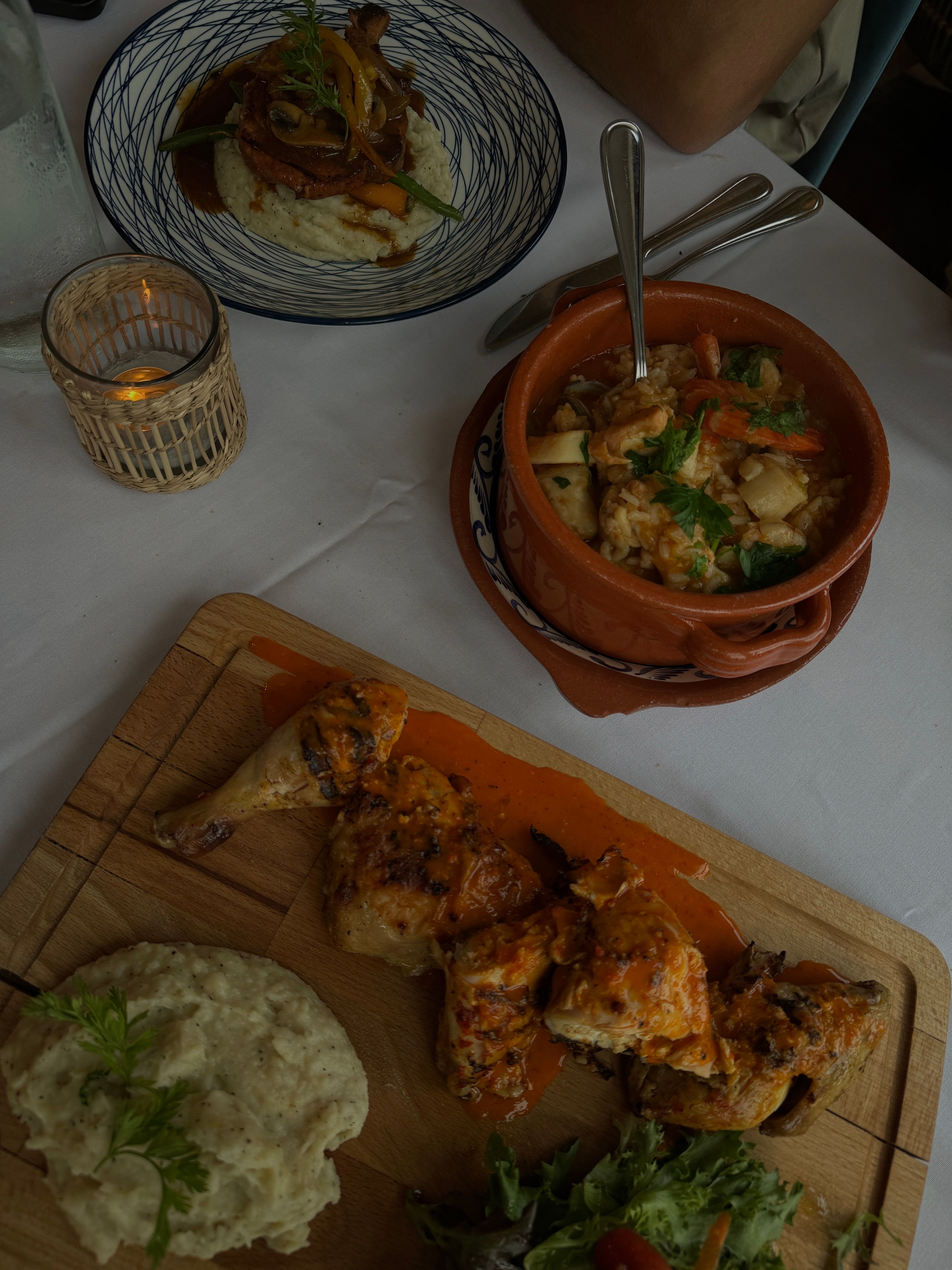 Savor a rustic meal featuring roasted chicken, mashed potatoes, and fresh veggies in Huntsville, ON.