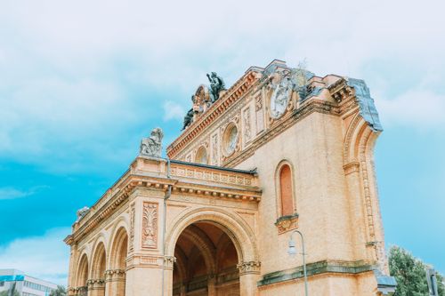Free Explore the intricate details of a historic Gothic arch captured beautifully outdoors. Stock Photo