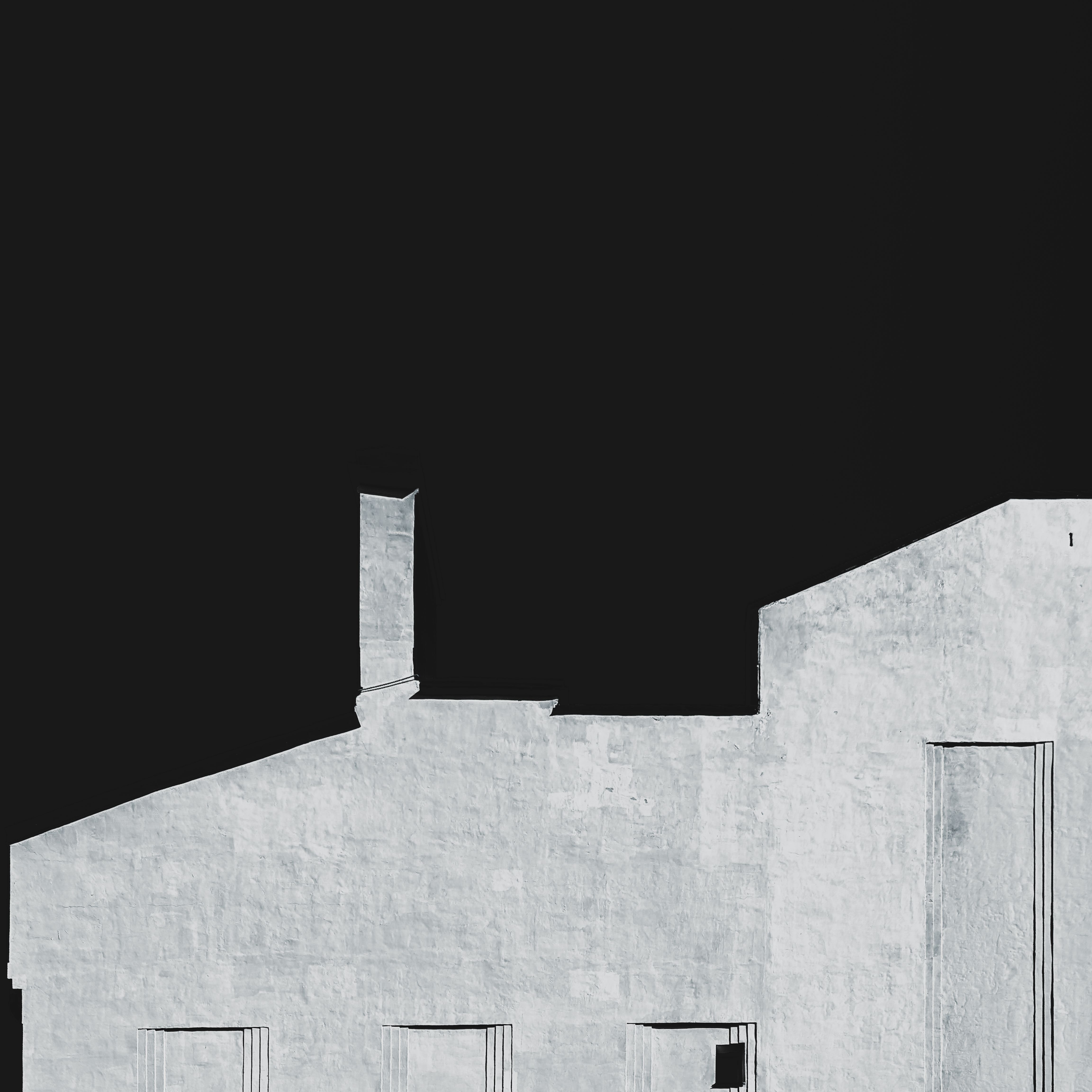 An abstract view of a building facade silhouetted against a dark sky in Vyborg, Russia.