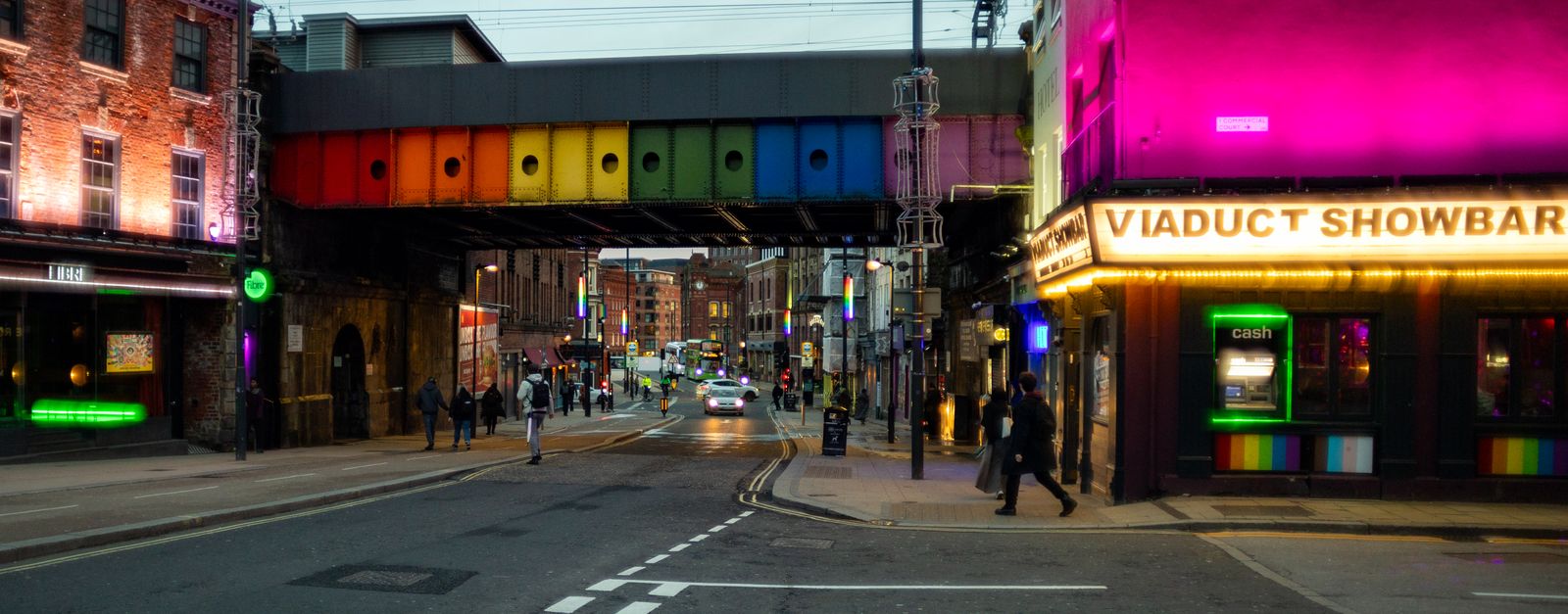 Colorful street with neon lights and nightlife vibes in Leeds, UK.
