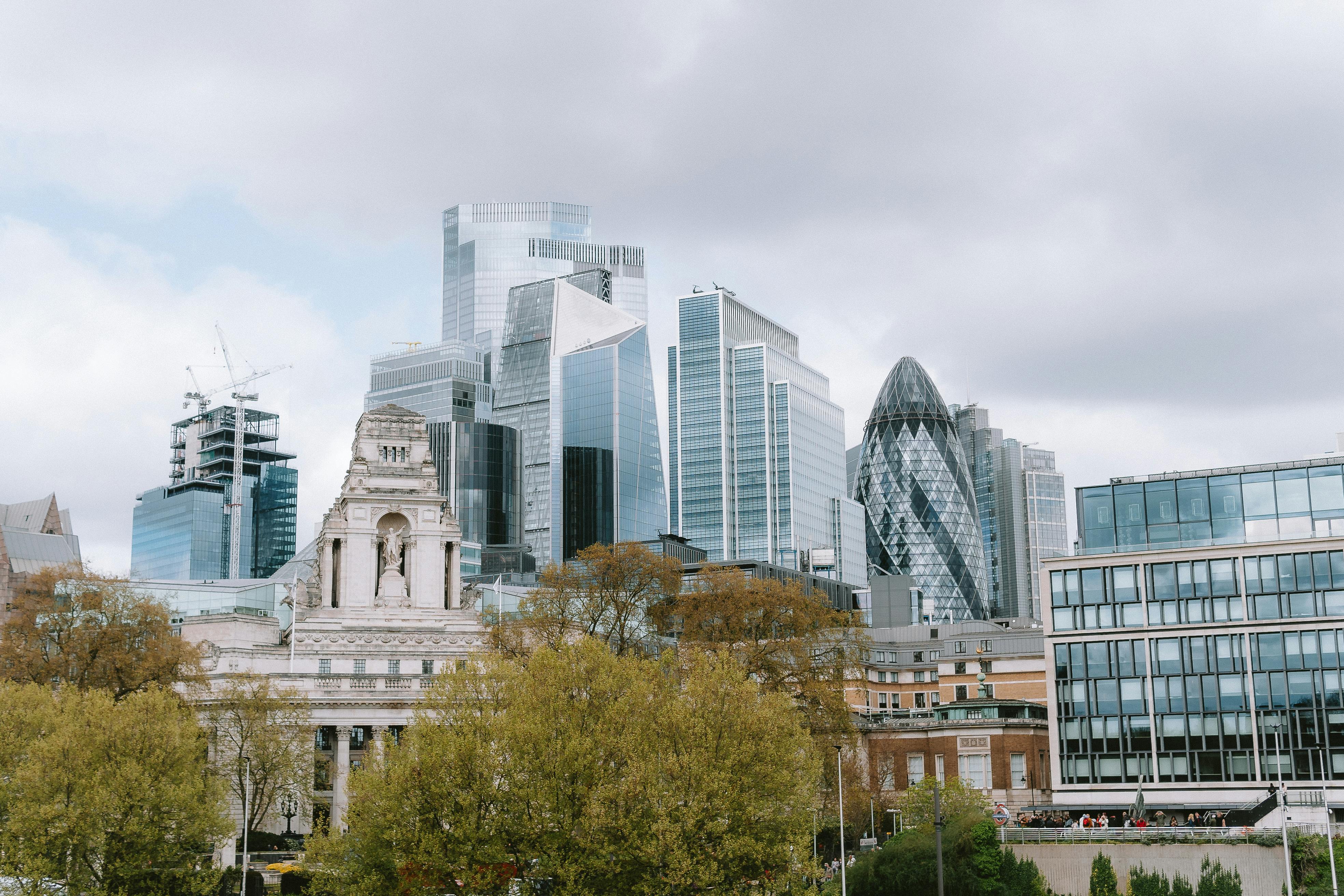 the city of london skyline with buildings and trees