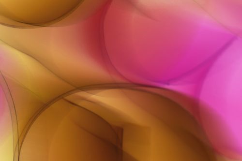 Free Vibrant abstract image featuring dynamic curves and colorful gradients in pink and gold hues. Stock Photo