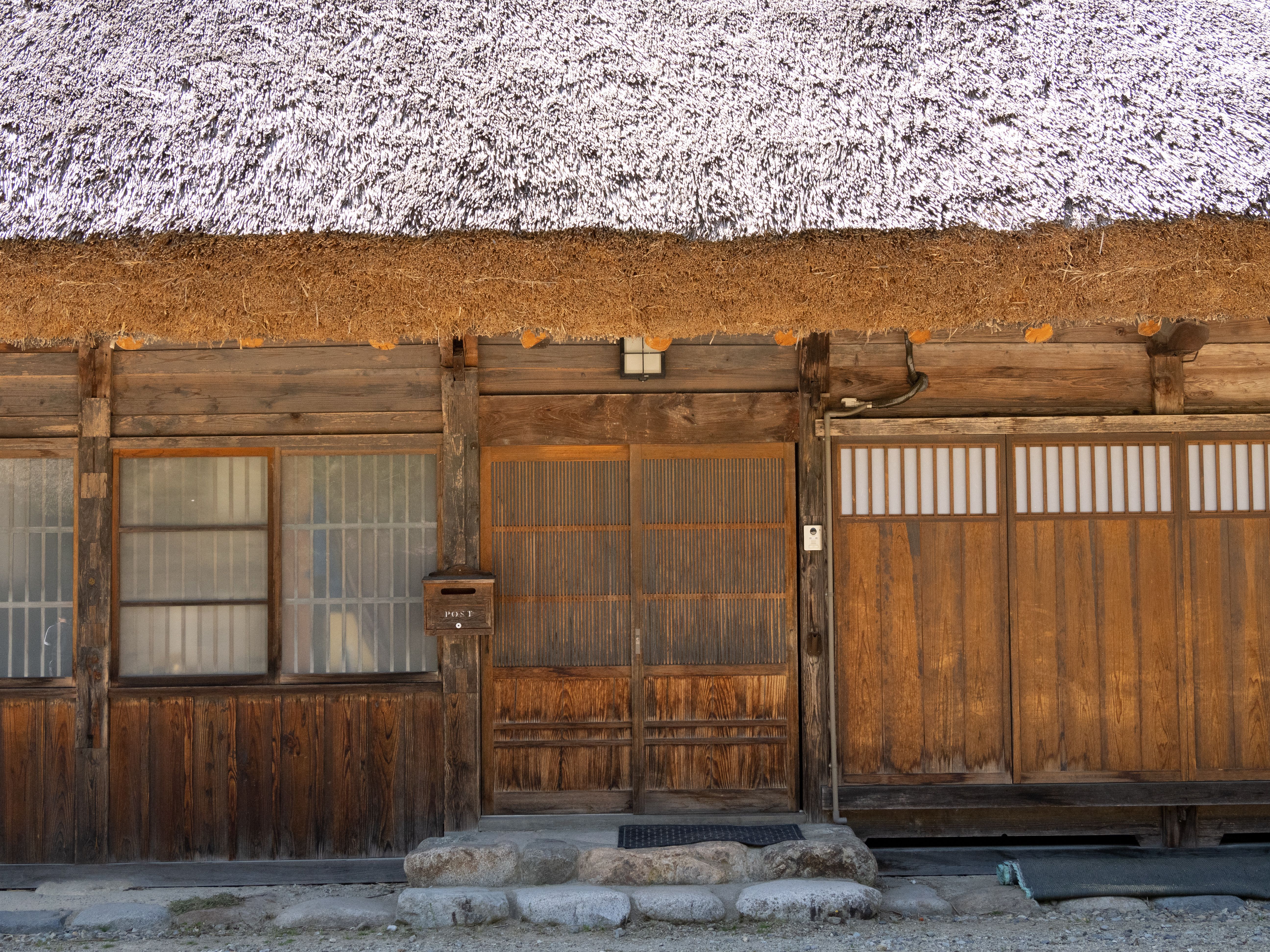 Traditional Japanese wooden farmhouse facade -- kominka architecture common in akiya listings