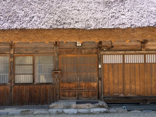 Free Explore the rustic charm of a traditional thatched-roof house in Shirakawa-go, Japan. Stock Photo