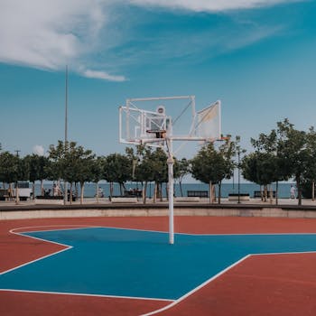 Vibrant basketball court by the seafront in Antalya, Turkey. Perfect for outdoor sports activities.