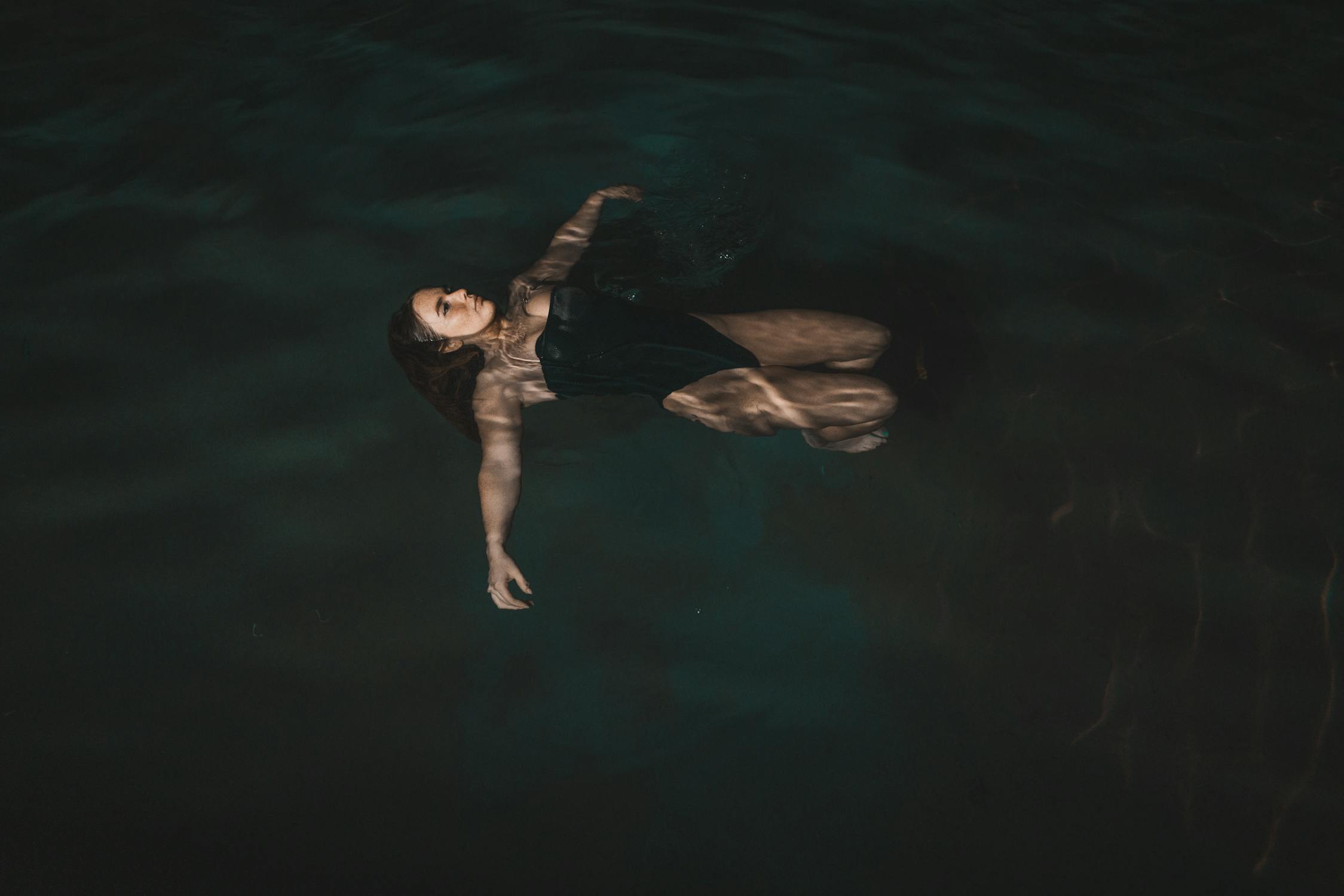 Woman Floating on Water · Free Stock Photo