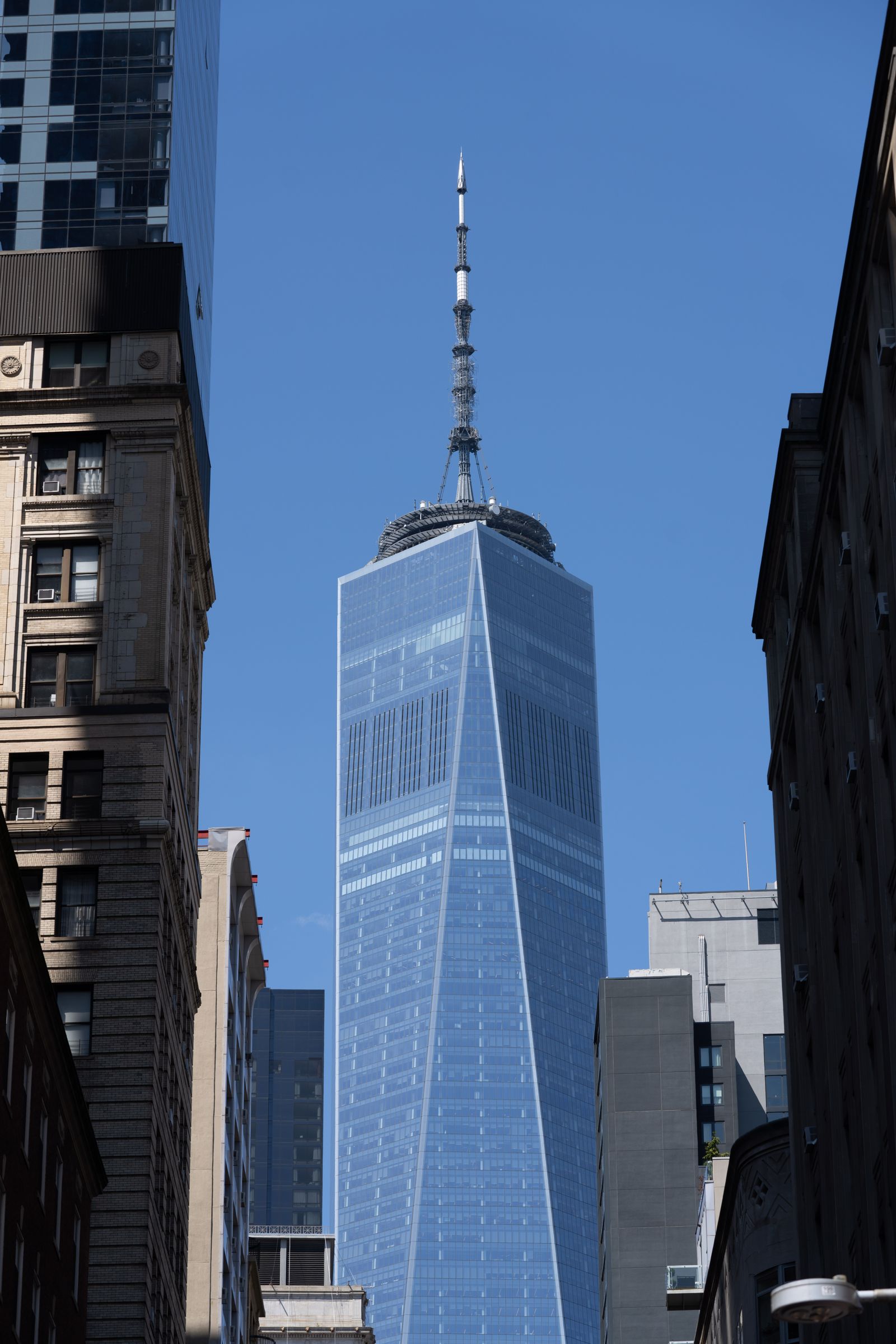 Blue High-Rise Building Towering Over The Cityscape · Free Stock Photo