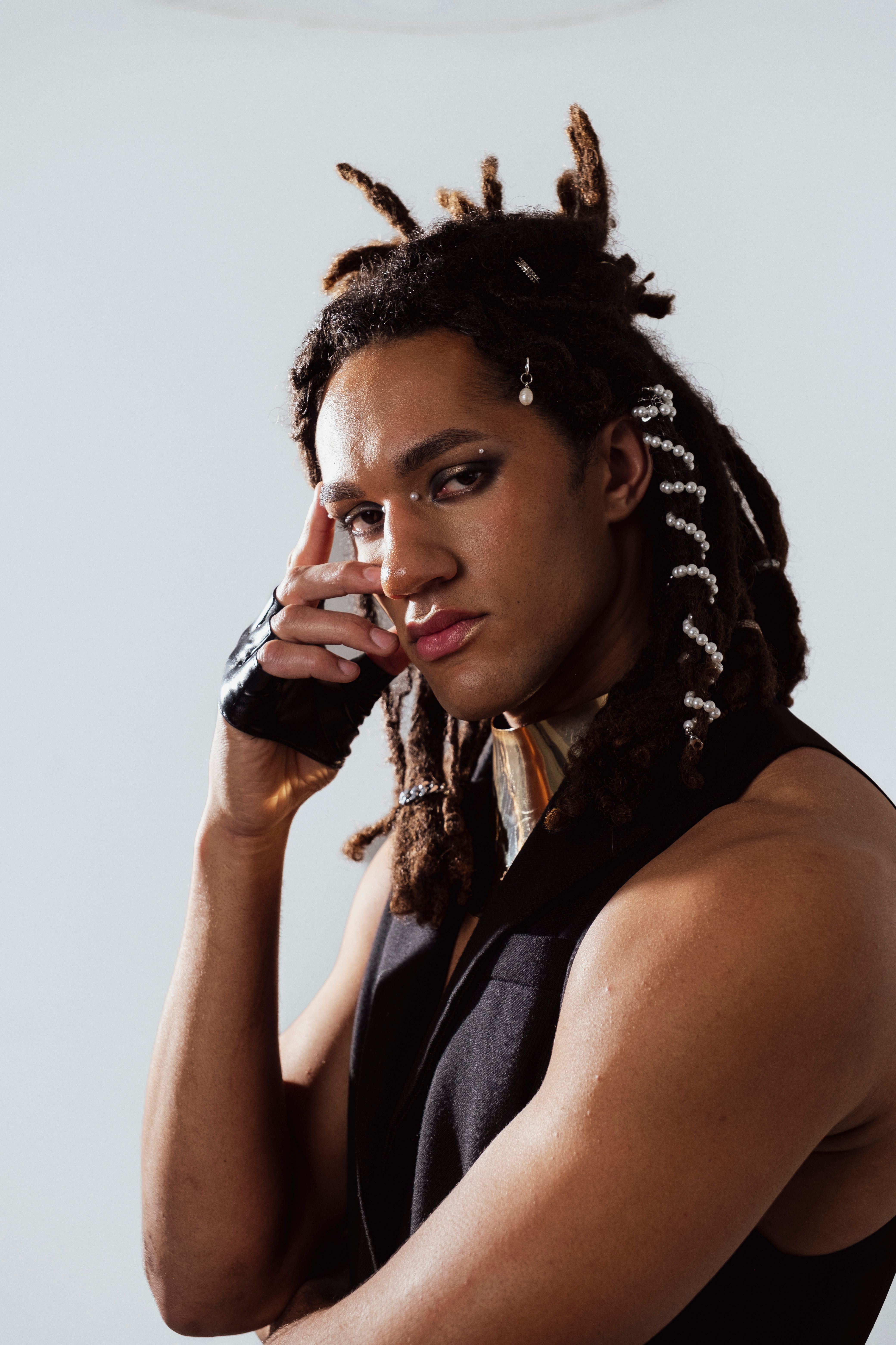 Model in Black Waistcoat and Fingerless Gloves Posing in the Studio ...