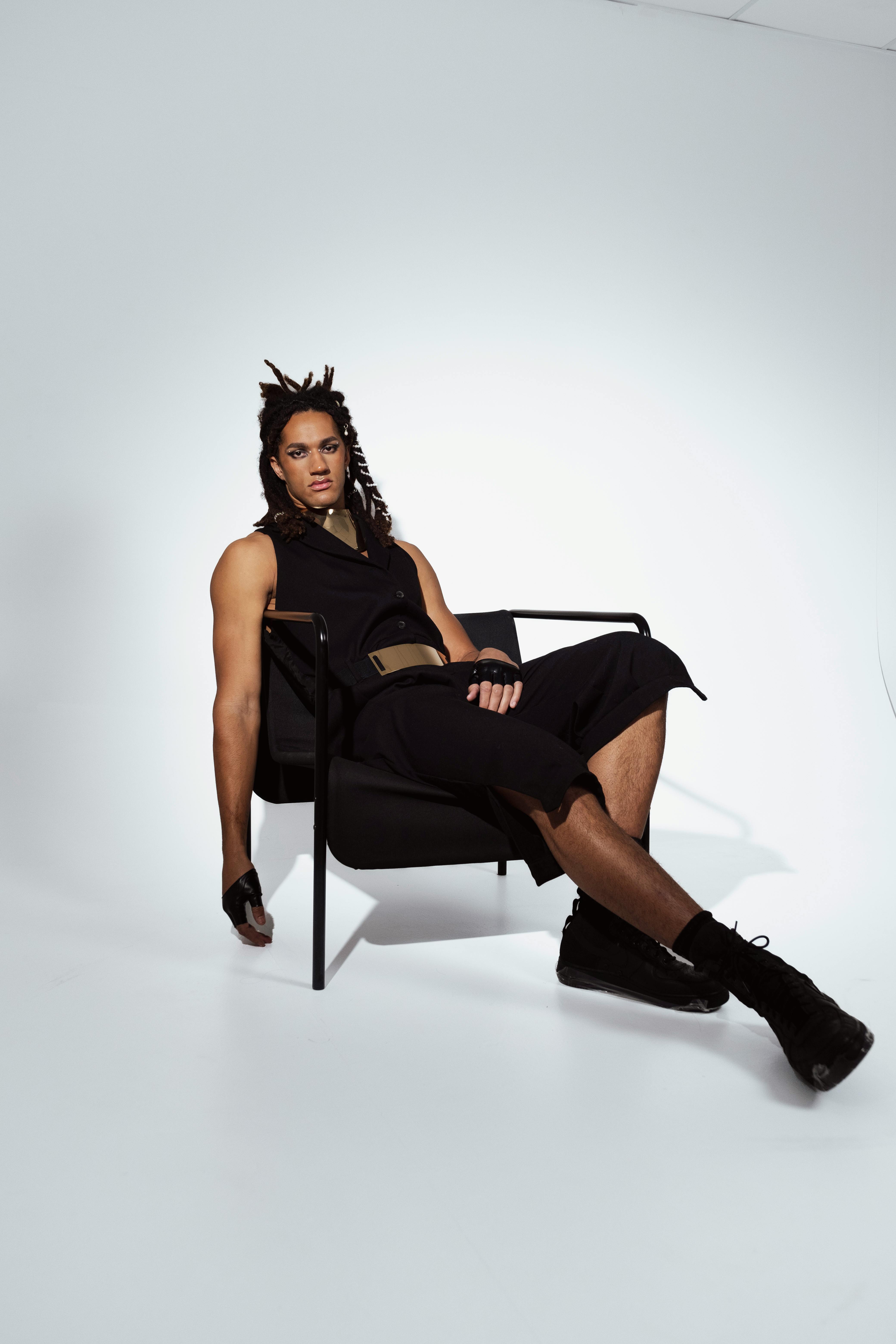 Fashion portrait of a young adult model with an elegant and modern style.