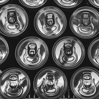 Rows of soda can lids viewed from above — photo by Oluwadamilola Ajayi on Pexels