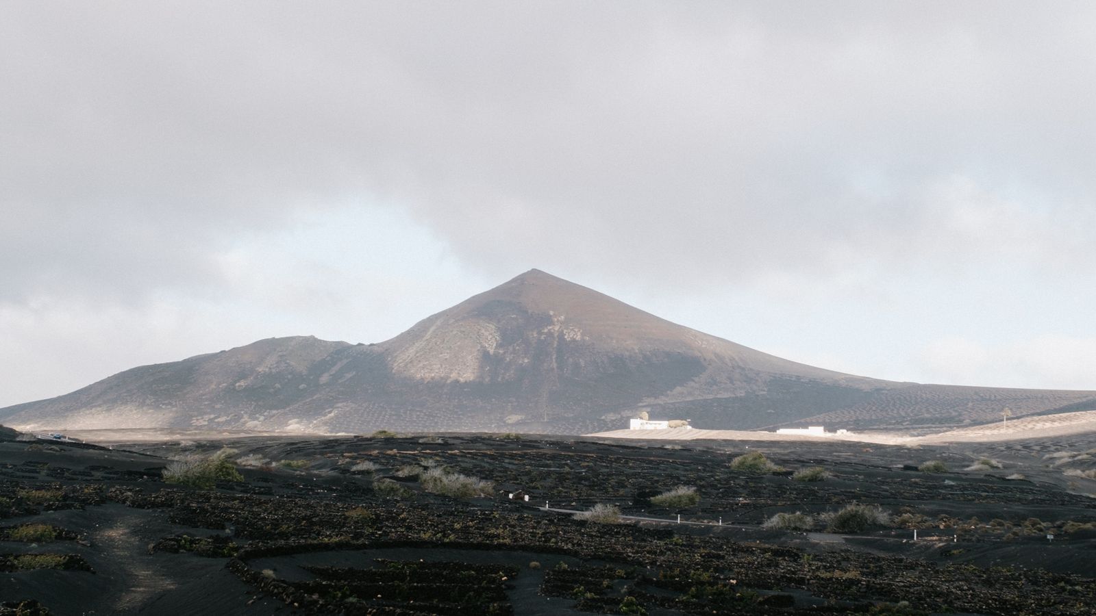 A mountain with a black cloud in the background, Cabo Verde