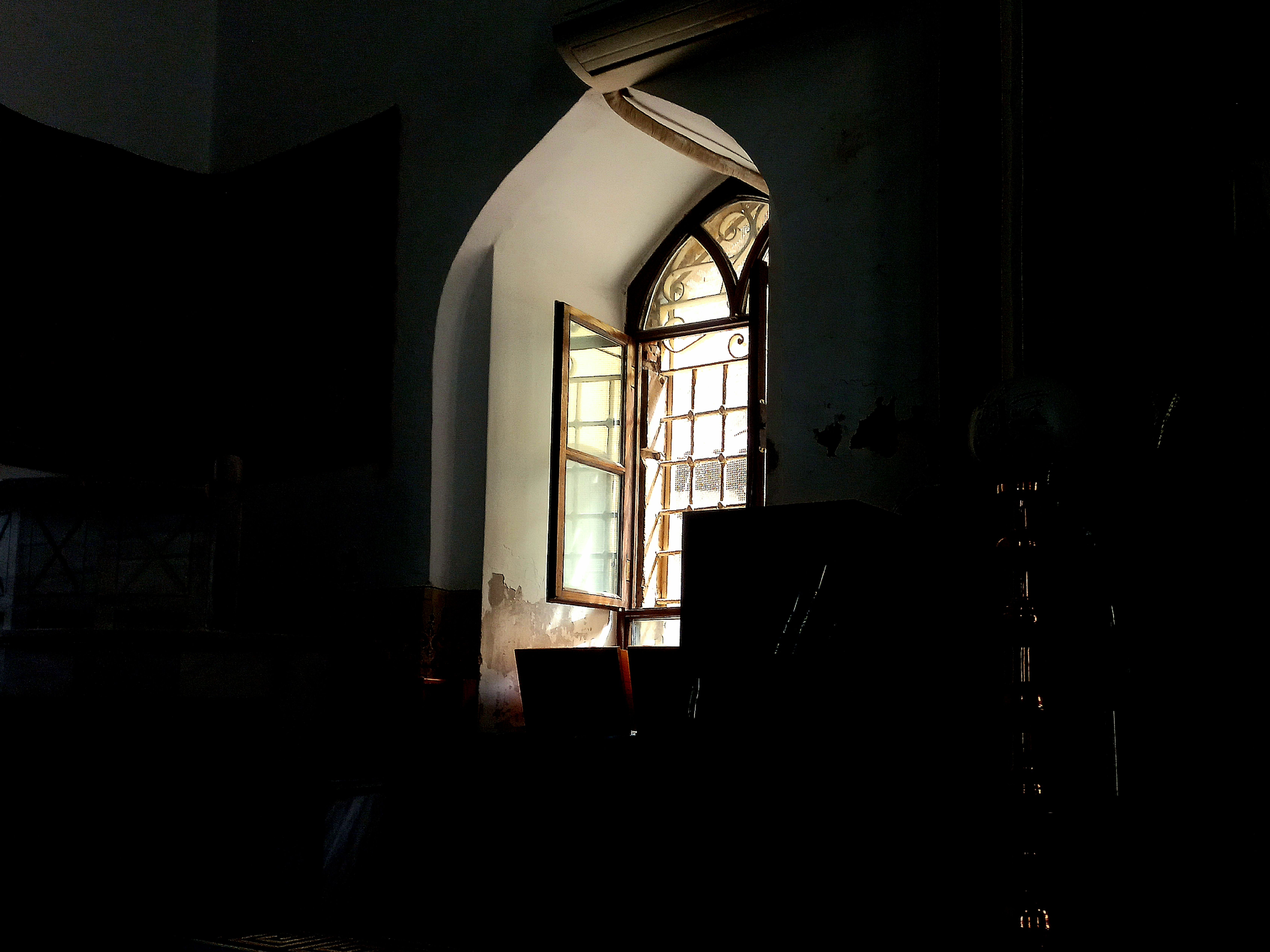 View of a Dark Interior and an Open Window · Free Stock Photo