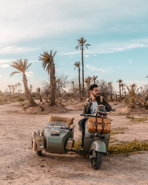 Man Riding Motorcycle With Sidecar 