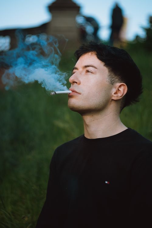 man smoking cigarette aesthetic 750+ Pictures Royalty-Free photo: Grayscale photography of