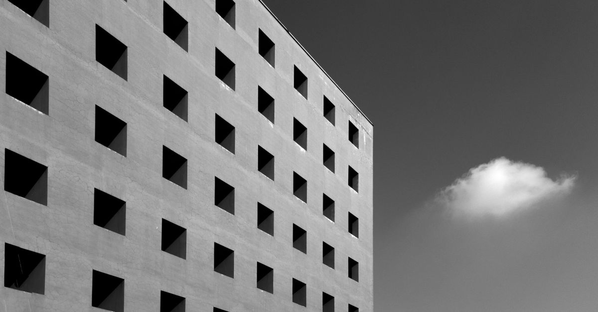 Grey Colorhi Rising Building Gray High-rise Building · Free Stock Photo