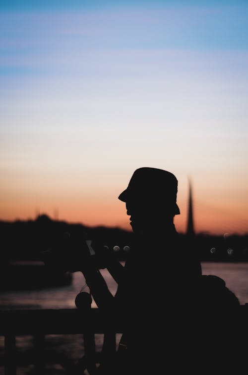 Silhouette Photo Of Person During Dawn