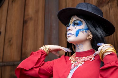 Free Celebrate Día de los Muertos with elaborate makeup and traditional attire in Mexico City. Stock Photo