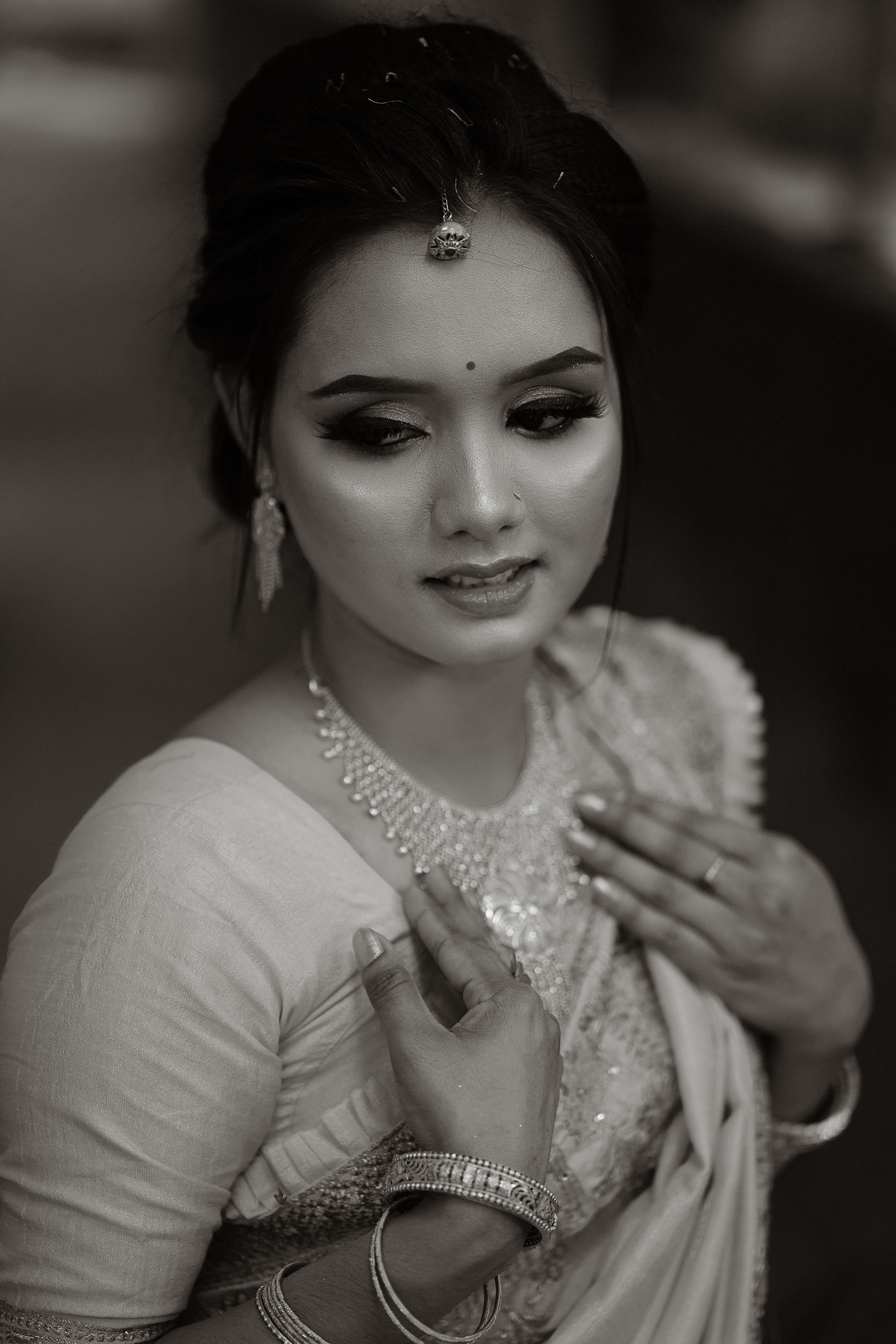 A beautiful woman in a sari posing for the camera · Free Stock Photo