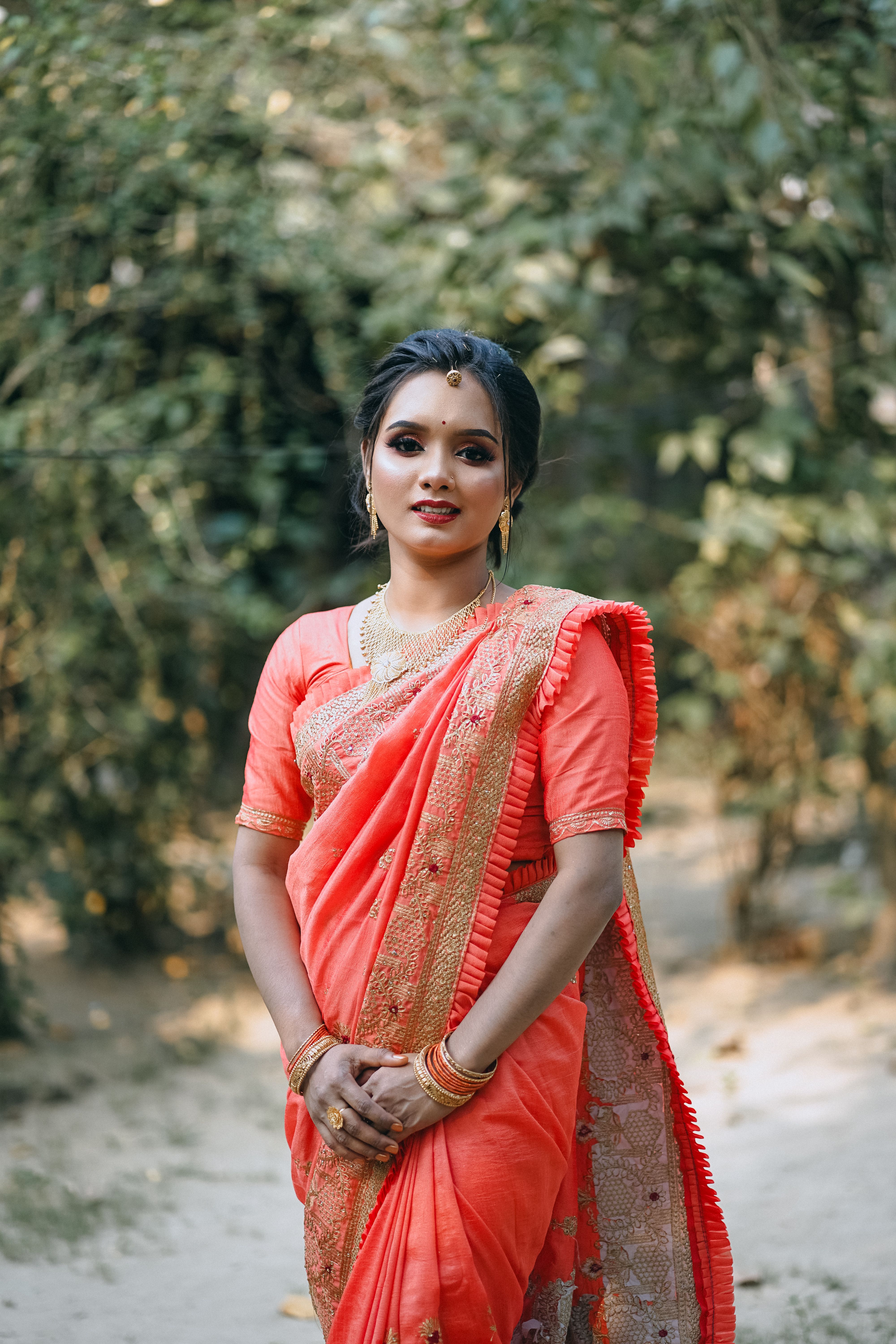 A beautiful woman in a red sari · Free Stock Photo