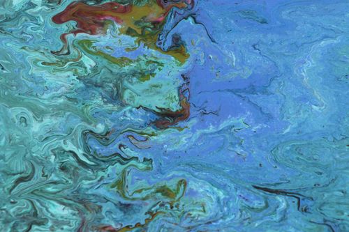 Free A mesmerizing abstract watercolor texture with swirling blue and turquoise patterns, evoking the ocean's fluidity. Stock Photo