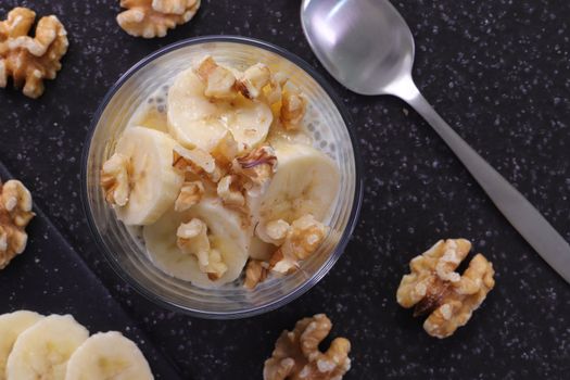 Top view of banana and walnut parfait, perfect for a healthy breakfast.