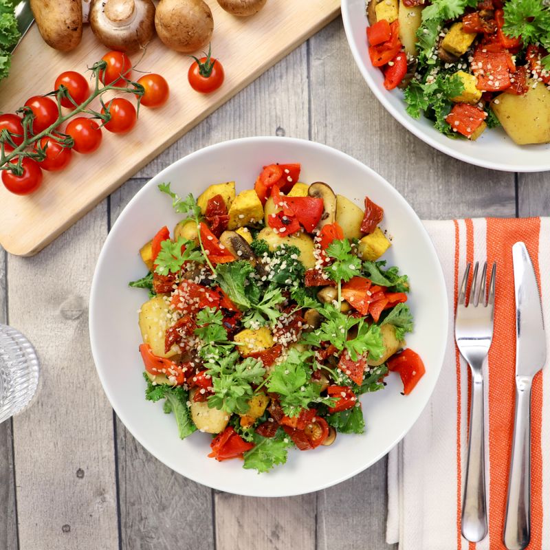 Israeli Shakshuka Quinoa Bowl with Roasted Peppers and Tahini