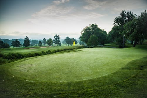 Ilmainen kuvapankkikuva tunnisteilla auringonnousu, golfkenttä, vihreä