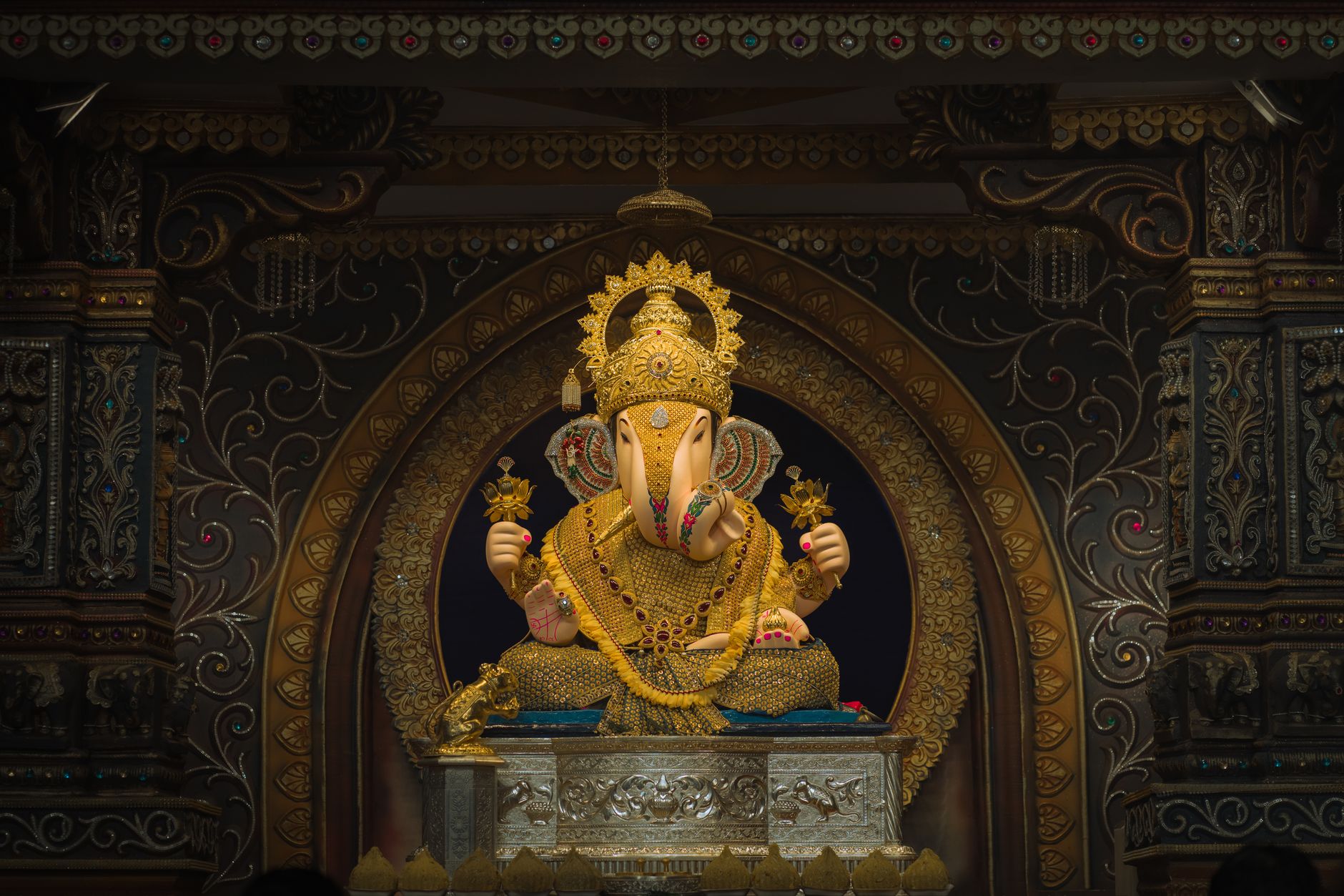A beautifully decorated idol of Lord Ganesh, showcasing traditional Hindu art and cultural heritage. Captured in Pune, India.