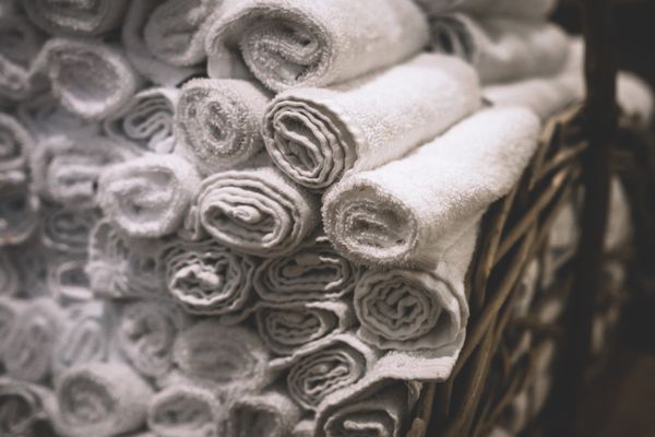 Stacks of freshly cleaned towels ready for delivery