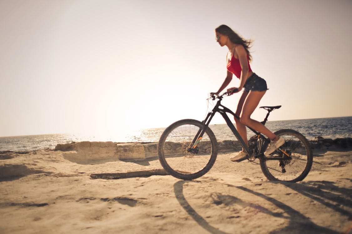 Woman Riding A Mountain Bike