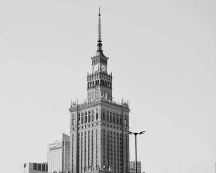 Black and white photo of the Palace of Culture and Science in Warsaw, Poland.