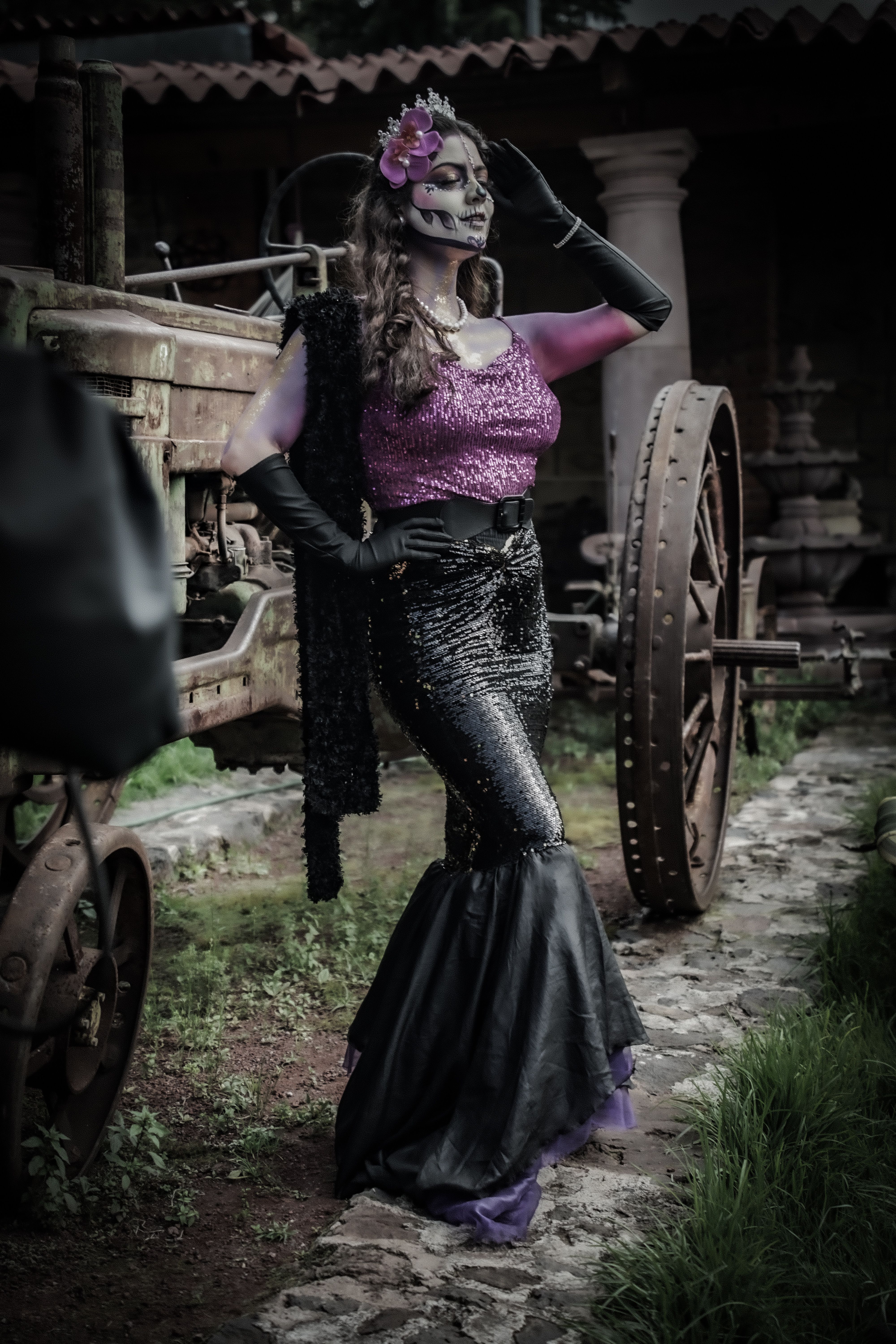 A woman dressed as a skeleton in a purple dress · Free Stock Photo