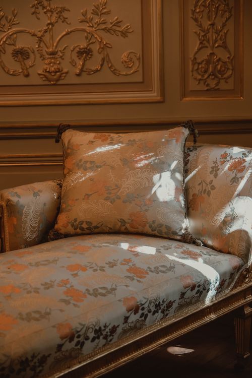 Free Luxurious vintage sofa with intricate floral patterns in a classic interior setting. Stock Photo