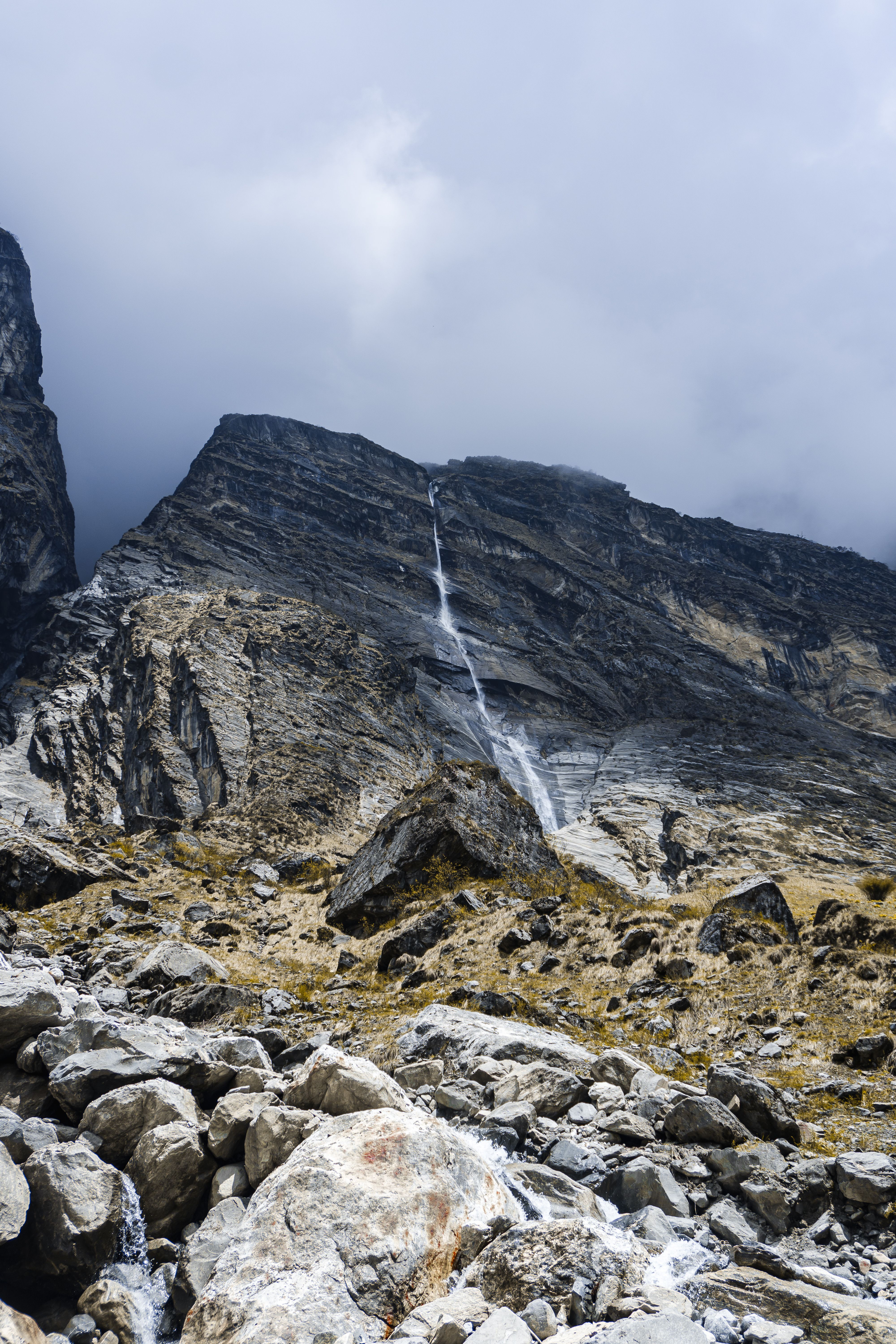 A mountain with a waterfall on it · Free Stock Photo