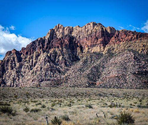 Free Stunning view of Red Rock Canyon's vibrant geological formations under a clear blue sky. Stock Photo