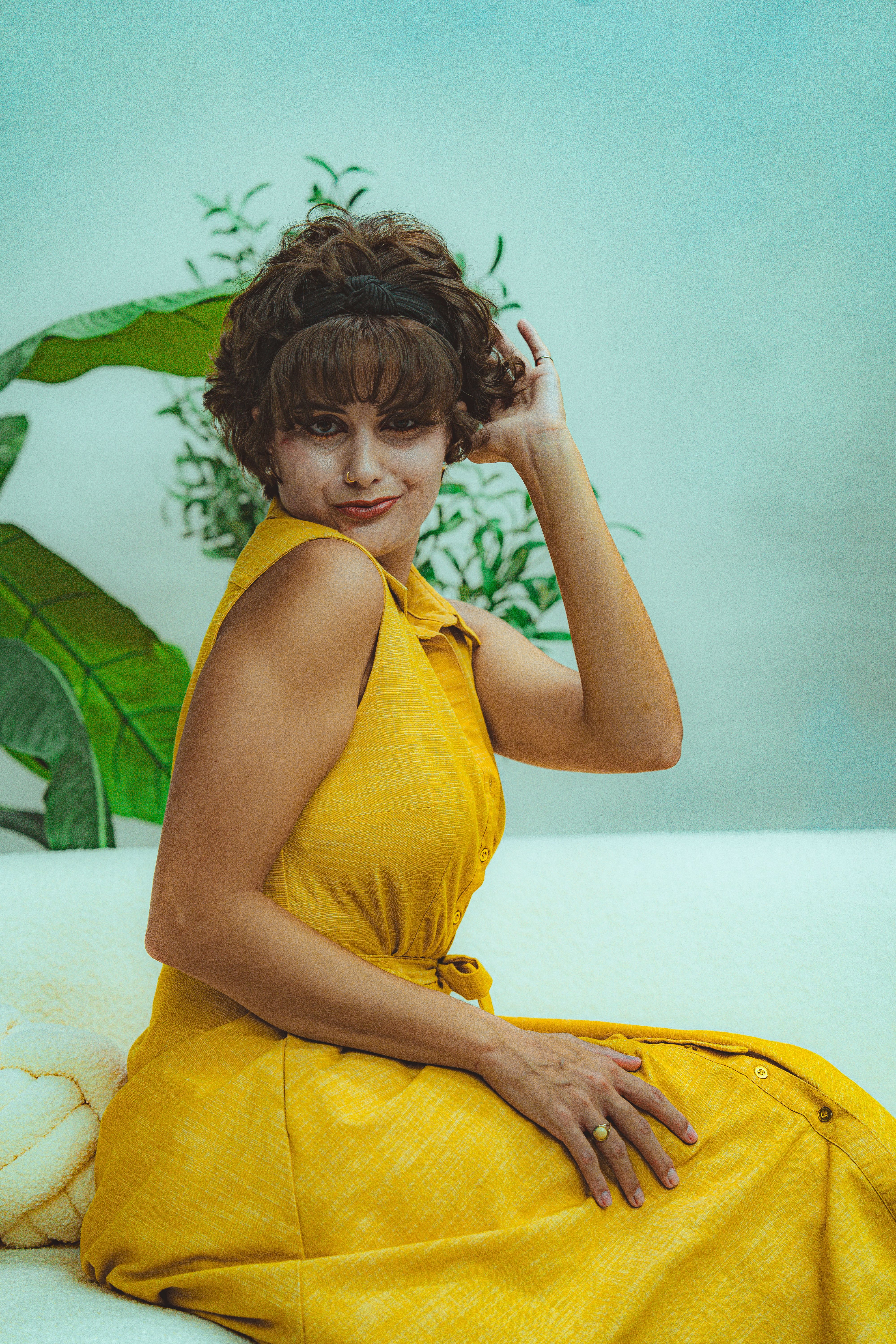 Casual Portrait of Woman in Yellow Dress Indoors · Free Stock Photo
