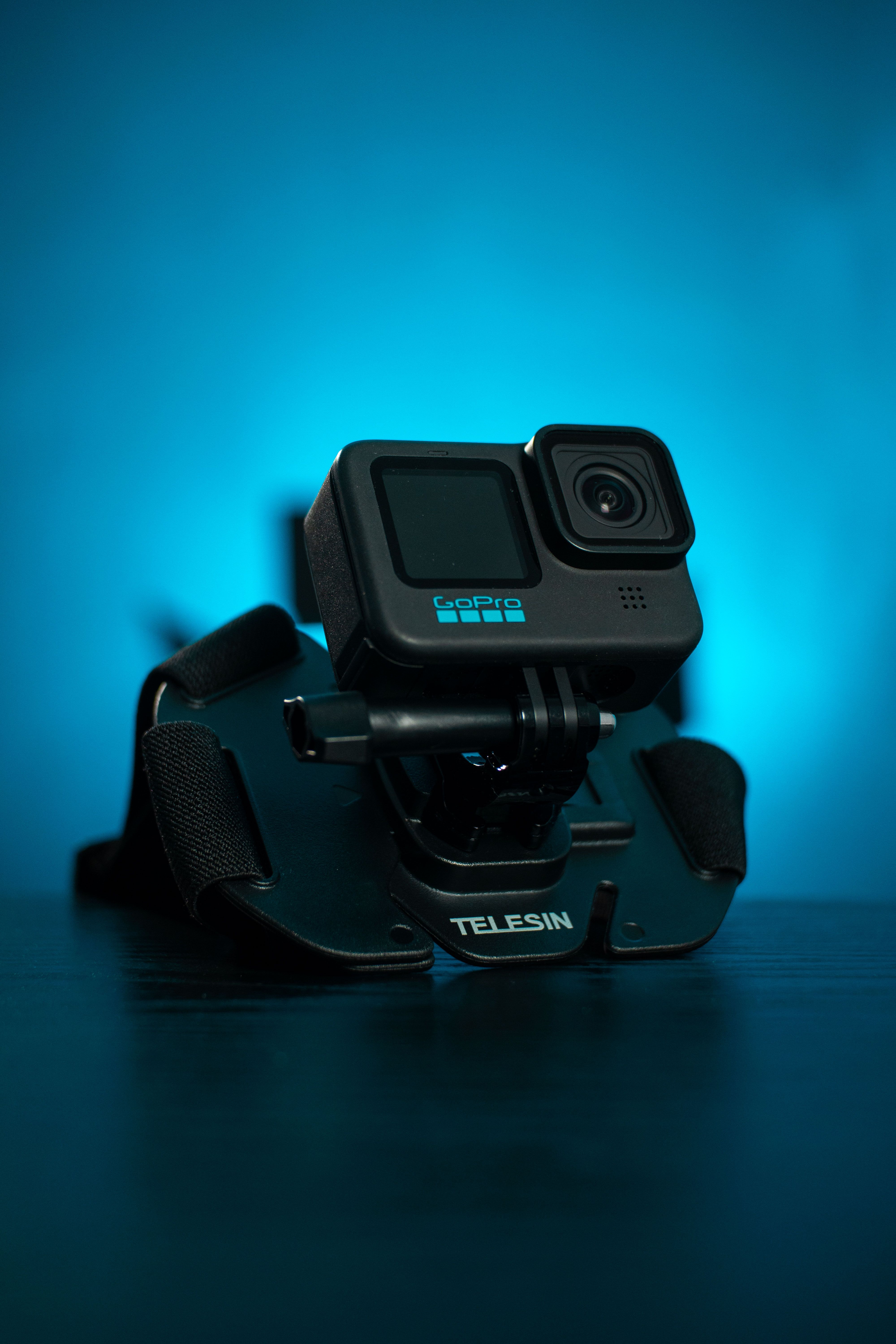 Black Action Camera on Adjustable Head Mount · Free Stock Photo
